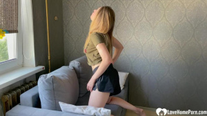 Smoking MILF masturbating on the couch at home