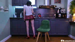 Schoolgirl goes for a solo in the kitchen